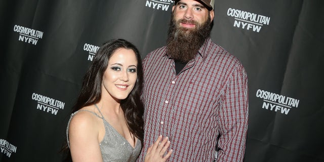Janelle Evans and David Eason pose at the Cosmopolitan New York Fashion Week #Eye Candy event After Party at Planet Hollywood Times Square on February 8, 2019 in New York City.