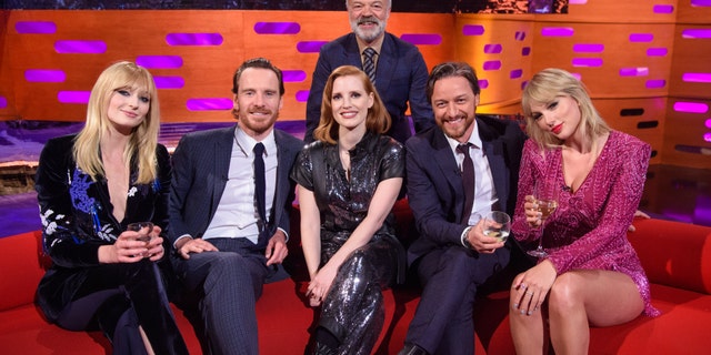 Host Graham Norton with (left to right) Sophie Turner, Michael Fassbender, Jessica Chastain, James McAvoy and Taylor Swift during the filming of the Graham Norton Show at BBC Studioworks 6, Television Centre, Wood Lane, London, to be aired on BBC One on Friday evening. (Photo by Matt Crossick/PA Images via Getty Images)