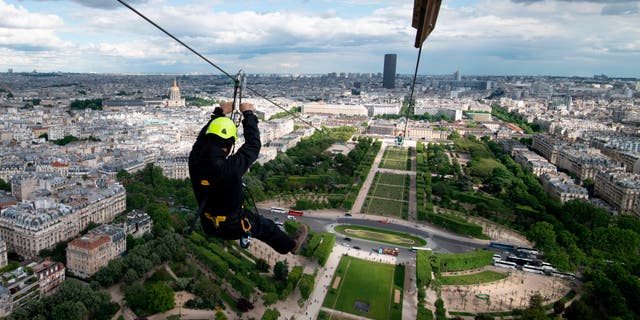 The 60-second ride will take participants up 377-feet in the air and plunge them across the Champs de Mars park at over 56 miles per hour.