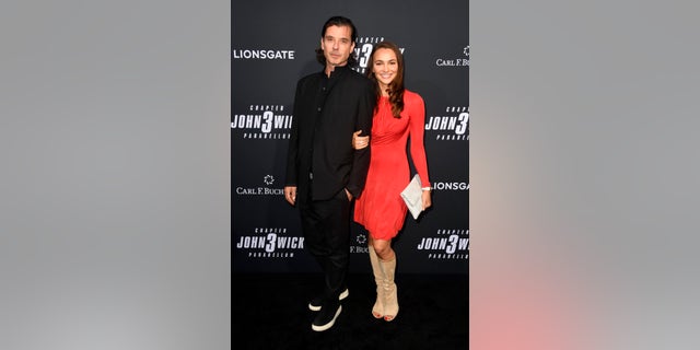 Gavin Rossdale and Natalie Golba keep close on the red carpet for a special screening of Lionsgate's "John Wick: Chapter 3 - Parabellum" on May 15, 2019 in Hollywood, Calif.
