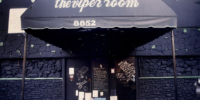 The exterior of The Viper Room the day after the death of actor River Phoenix. Fans have left flowers, candles and notes at the spot where he collapsed on November 1, 1993, in Los Angeles, California.
