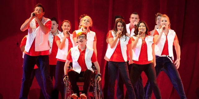 The cast of Glee performs onstage during the 2011 "GLEE Live" Concert Tour
