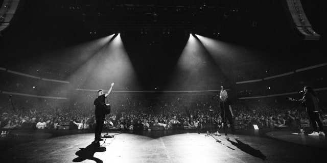 Bethel Music co-founders Brian and Jenn Johnson lead worship during the "Heaven Come" conference in downtown Los Angeles, California.