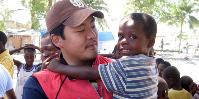 Human rights activist Adrian Hong, seen here in Haiti, was accused in the embassy break-in.
