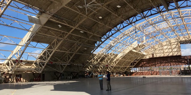 The hangar at Tyndall Air Force Base, shown here, won't be repaired because it would be too costly to do so.