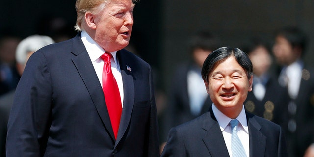 President Trump and Japan's Emperor Naruhito at Monday's ceremony. 