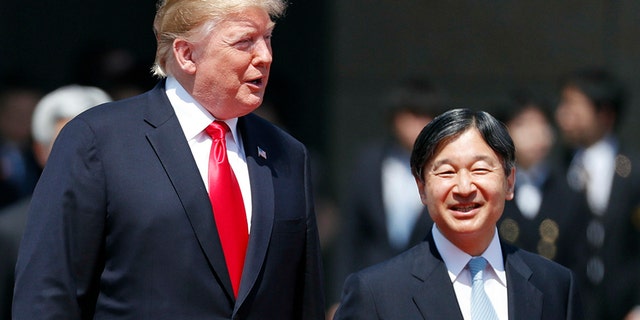 President Trump and Japan's Emperor Naruhito at Monday's ceremony. 