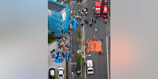 The scene of the attack Tuesday morning in Kawasaki City, Japan. (Jun Hirata/Kyodo News via AP)