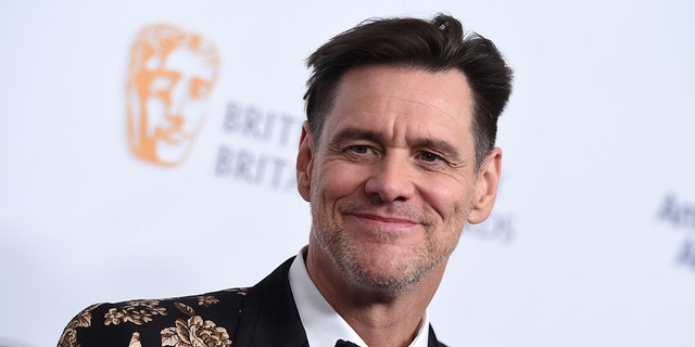 Jim Carrey arrives at the BAFTA Los Angeles Britannia Awards at the Beverly Hilton in Beverly Hills, California, on Oct. 26, 2018. (Jordan Strauss/Invision/AP)