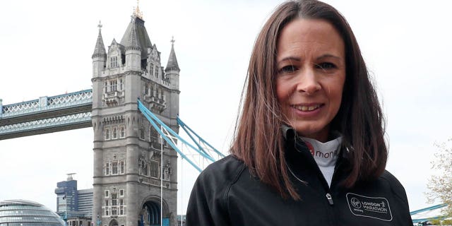 Jo Pavey poses for photographers during a photocall at Tower Hotel, London, ahead of the London Marathon. (Photo by Gareth Fuller/PA Images via Getty Images)