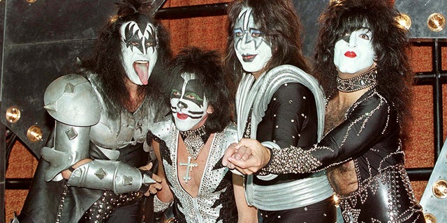 Band members Gene Simmons, Peter Criss, Ace Frehley and Paul Stanley during a news conference at Mann's Chinese Theatre in Hollywood promoting their album "Psycho Circus."