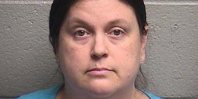 Thompson's co-workers at the elementary school heard her allegedly make a threat to "shoot up" the school and alerted law enforcement. (Orange County Sheriff’s Office via AP)