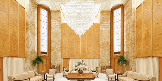 Dubbed "the beacon on the hill" because of its bright lights visible for miles at night, the 90,000-square-foot temple is known for its imposing granite walls, monolithic architecture, and five golden spires, the tallest reaching 170 feet.