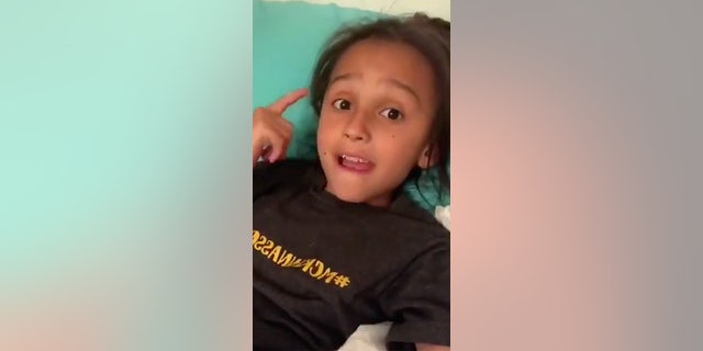 London Eisenbeis could not contain her excitement at finally being tall enough, at least 48 inches, to ride the highest waterslide at Zehnder's Splash Village, a Michigan amusement park.