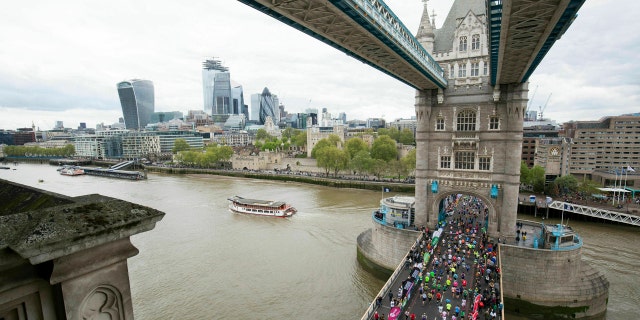 A British nurse who ran the London Marathon in her uniform was initially denied a Guinness World Records listing because she wasn't wearing a skirt, only scrubs.