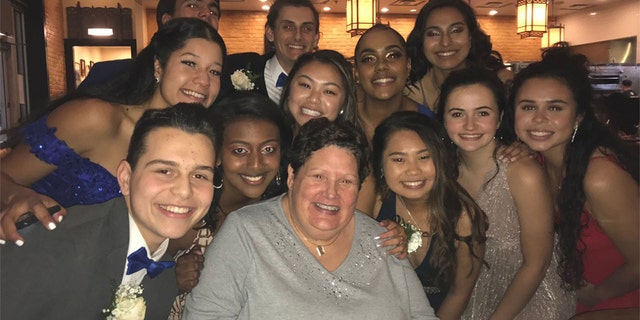 An older woman paid for the dinner of a group of kids from Clarksburg High School on prom night. (Therese de Leonn)
