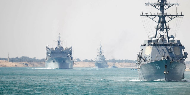 In this Thursday, May 9, 2019 photo released by the U.S. Navy, the Abraham Lincoln Carrier Strike Group transits the Suez Canal in Egypt. (Mass Communication Specialist 3rd Class Darion Chanelle Triplett/U.S. Navy via AP)