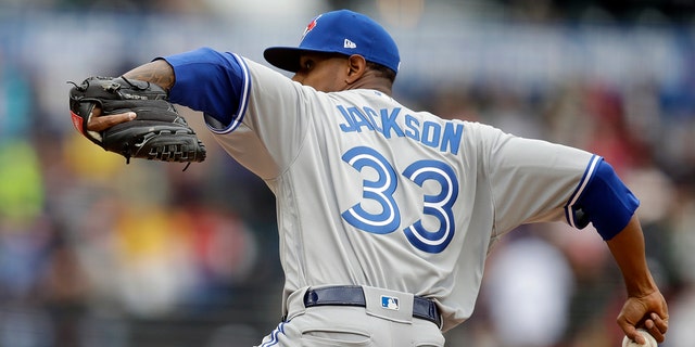 Toronto Blue Jays pitcher Edwin Jackson works against the San Francisco Giants in the first inning of a baseball game Wednesday, May 15, 2019, in San Francisco. (AP Photo/Ben Margot)