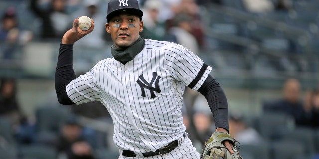 New York Yankees' Miguel Andujar throws to first base during the second inning of the team's baseball game against the Baltimore Orioles at Yankee Stadium in New York. (AP Photo/Seth Wenig, File)