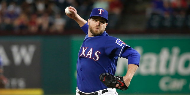 Shawn Kelley #27 of the Texas Rangers throws against the Toronto Blue Jays during the ninth inning at Globe Life Park in Arlington on May 4, 2019 in Arlington, Texas. (Photo by Ron Jenkins/Getty Images)
