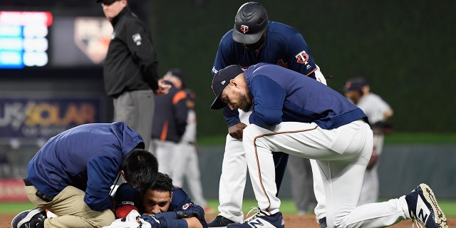 Marwin Gonzalez, of the Minnesota Twins, collided with the Detroit Tigers' Niko Goodrum at first base during their game on Friday.<br data-cke-eol="1">