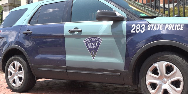 The seal and motto are featured on Massachusetts State Police cars.