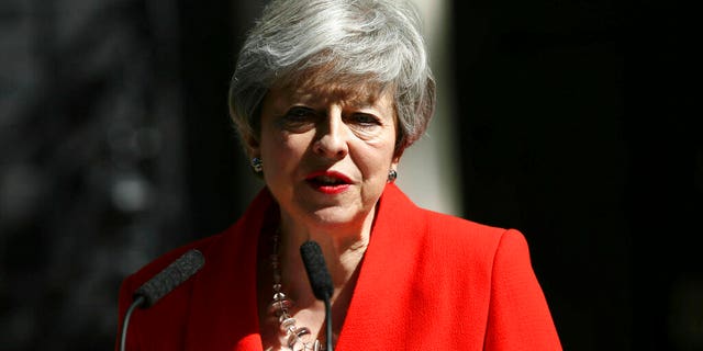 Britain's Prime Minister Theresa May makes a statement outside at 10 Downing Street in London, Friday May 24, 2019. Theresa May says she'll quit as UK Conservative leader on June 7, sparking contest for Britain's next prime minister. (Yui Mok/PA via AP)