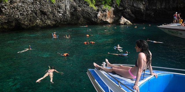 The Phi Phi islands have been popular with tourists since they were featured in Danny Boyle’s 2000 film "The Beach," but authorities say visitors contributed to the damage of the coral reefs.