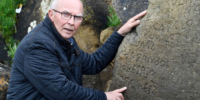 The inscriptions composed of indecipherable words on a rock in the Brittany village of Plougastel-Daoulas. The city launched a national call with a 2,000 euros reward to anyone able to solve the mystery of those inscriptions probably made during the 18th century.