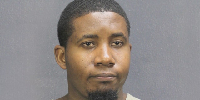 Mikenson Regis, pictured, is now behind bars for hiding two guns and ammunition in a custodian’s closet of Fort Lauderdale-Hollywood International Airport.