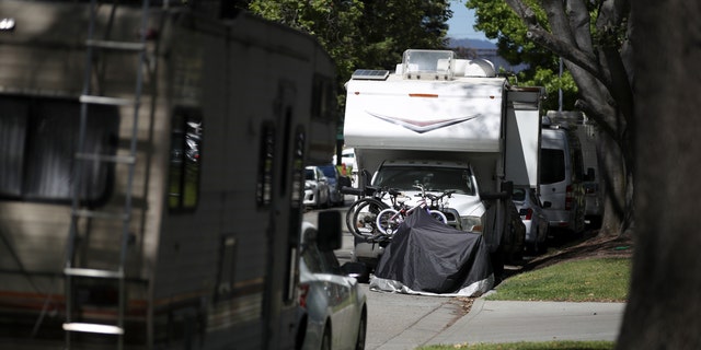 RVs sit parked on a street across from Google headquarters on May 22, 2019 in Mountain View, California. As the price of rent continues to skyrocket in the San Francisco Bay Area, a number of RVs have appeared on the streets near the Google headquarters in Mountain View.