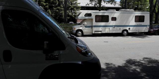 RVs parked on a street across from Google headquarters in Mountain View, California on May 22, 2019.