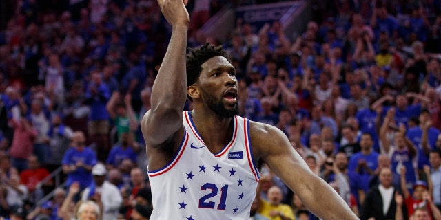 Philadelphia 76ers' Joel Embiid reacts to his dunk during the second half of Game 3 of the team's second-round NBA basketball playoff series against the Toronto Raptors, Thursday, May 2, 2019, in Philadelphia. The 76ers won 116-95. (AP Photo/Chris Szagola)