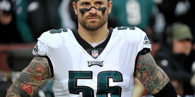 FILE - In this Dec. 30, 2018, file photo, Philadelphia Eagles defensive end Chris Long stands on the sideline prior to the team's NFL football game against the Washington Redskins in Landover, Md. (AP Photo/Mark Tenally, File)