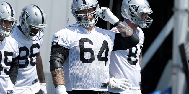 Oakland Raiders guard Richie Incognito (64) warms up during an official team activity at the NFL football team's headquarters in Alameda, Calif., Tuesday, May 28, 2019. (AP Photo/Jeff Chiu)
