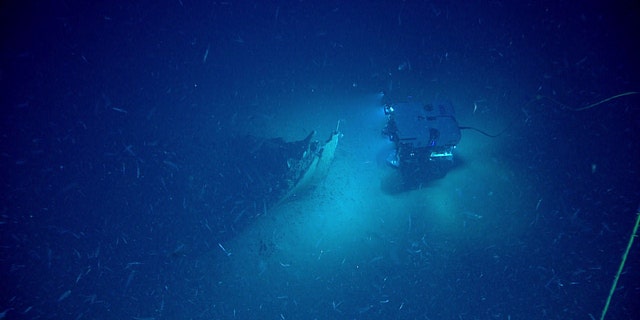 The Remotely Operated Vehicle (ROV) Deep Discoverer approaching the shipwreck's bow. (Image courtesy of the NOAA Office of Ocean Exploration and Research)