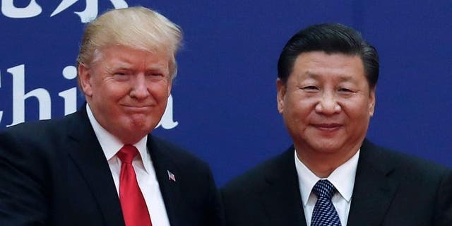 President Trump and China's President Xi Jinping, seen in an undated photo, are scheduled to meet later this month in Japan.