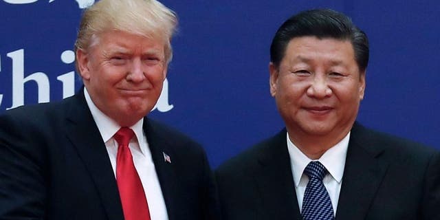 President Trump and China's President Xi Jinping, seen in an undated photo, are scheduled to meet later this month in Japan.