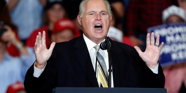 Radio personality Rush Limbaugh introduces President Donald Trump at the start of a campaign rally Monday, Nov. 5, 2018, in Cape Girardeau, Mo. (AP Photo/Jeff Roberson)