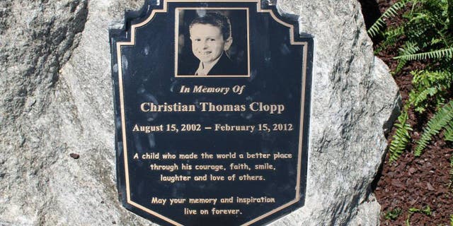 Two men were arrested on Sunday in connection to a video that reportedly shows a man urinating on a boy's memorial.