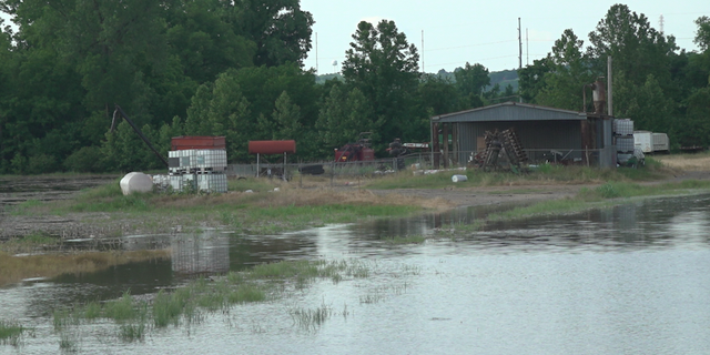 “This is farmland, you're not even supposed to be able to visually see the river right now,” Stewart said while behind Walmart, adjacent to the farm shown above.