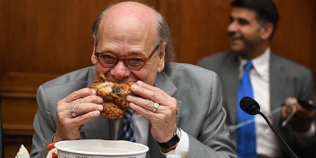 Rep. Steve Cohen, Democrat of Tennessee, eats chicken during a hearing before the House Judiciary Committee on Capitol Hill in Washington, DC, on May 2, 2019. (Photo by Jim WATSON / AFP) (Photo credit should read JIM WATSON/AFP/Getty Images)