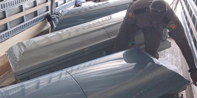 Multiple caskets turned up inside the truck.