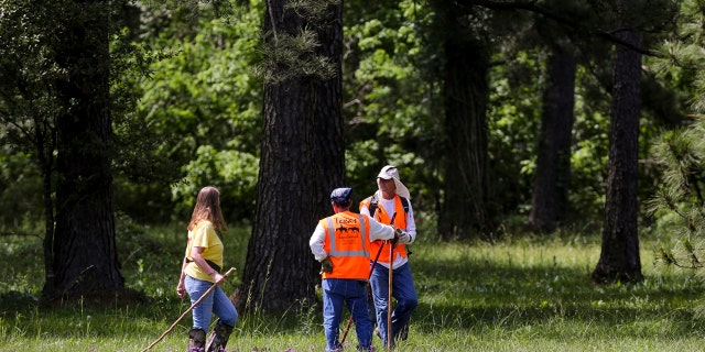 Members of Texas EquuSearch conduct a search for four-year-old Maleah Davis Monday, May 6, 2019, in Humble, Texas.