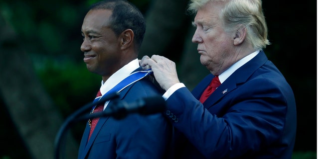 Trump presents 'true legend' Tiger Woods with Presidential Medal of ...