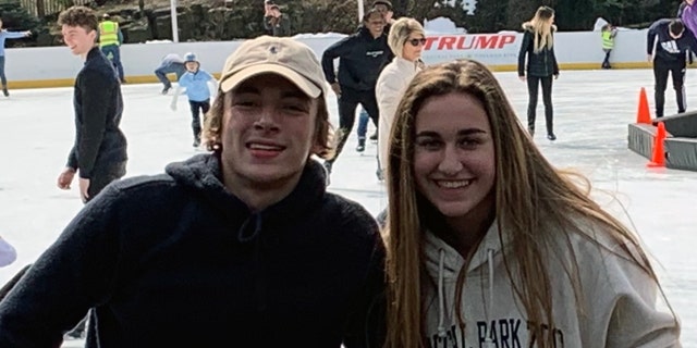 Tyler Smith, 17, and Heather Brown, 17, friends since fourth grade, were stranded in the ocean for two hours before being rescued by a boat named "Amen." They are pictured on their senior mission trip to New York City in March.