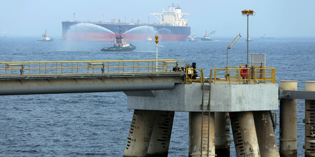 FILE - In this Sept. 21, 2016 file photo, an oil tanker approaches to the new Jetty during the launch of the new $650 million oil facility in Fujairah, United Arab Emirates. (AP Photo/Kamran Jebreili)