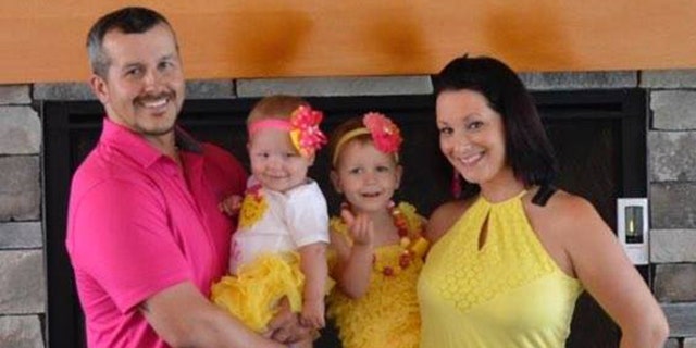 Chris and Shanann Watts with their daughters.