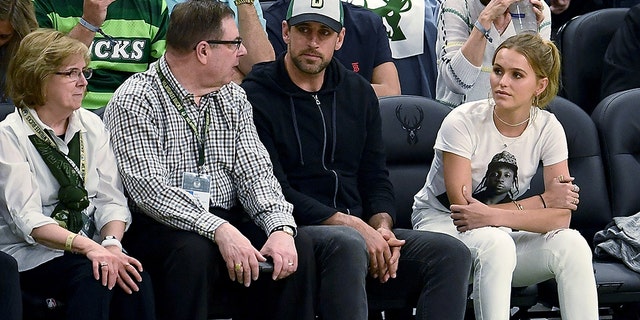 Mallory Edens, right, wears a Pusha T shirt, appearing to troll Drake. (Photo by Stacy Revere/Getty Images)