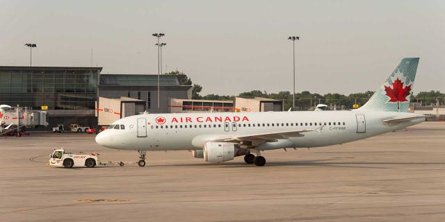 Five people aboard an Air Canada Express plane were injured on Friday when the aircraft was struck by a fuel track on the tarmac at Toronto Pearson International Airport.